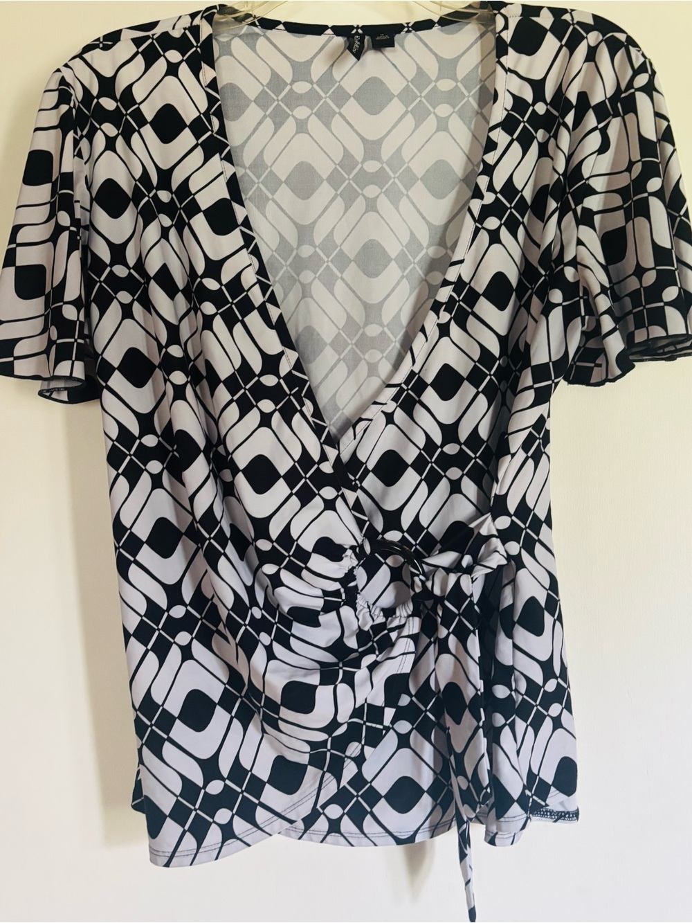 Essentials by Milano Black and White Geometric Wrap Blouse